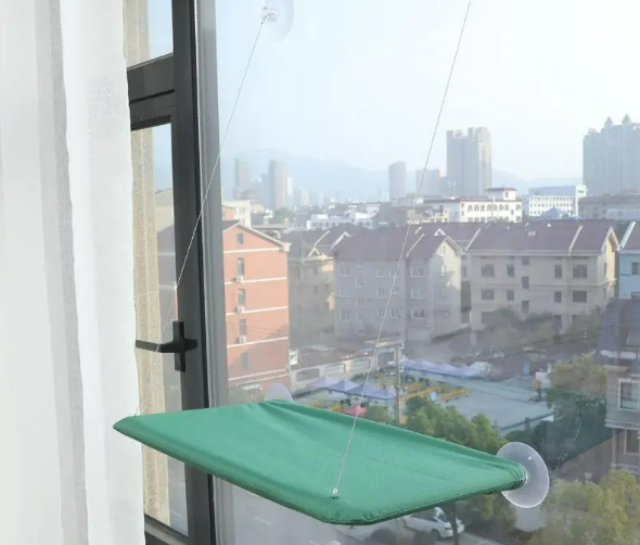 SnugNest™ — Hanging Cozy Pet Hammock