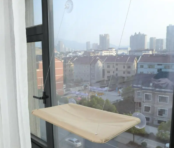 SnugNest™ — Hanging Cozy Pet Hammock